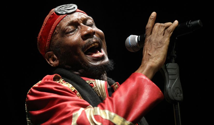 FILE - Jamaican musician, singer and actor Jimmy Cliff performs during the Timbre Rock and Roots concert on Friday March 22, 2013 in Singapore. (AP Photo/Wong Maye-E, File)