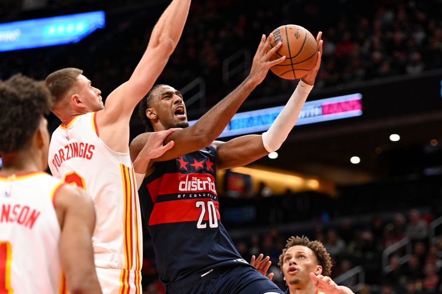 Washington Wizards center Alex Sarr (20) putting up a shot during the fourth quarter of an NBA game against the Atlanta Hawks at Capital One Arena in Washington D.C., November 25, 2025. (Photo for the Washington Times)