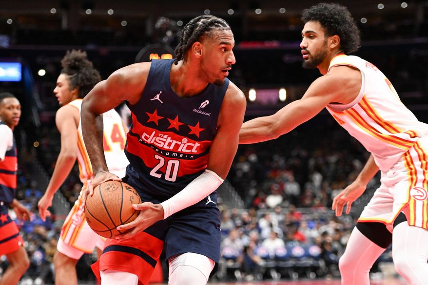 Washington Wizards center Alex Sarr (20) with the ball during the fourth quarter of an NBA game against the Atlanta Hawks at Capital One Arena in Washington D.C., November 25, 2025. (Photo for the Washington Times)
