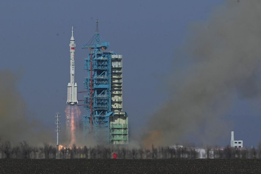 In this photo provided by China's Xinhua News Agency, the Shenzhou-22 spaceship is launched from the Jiuquan Satellite Launch Center in Jiuquan, northwestern China, Tuesday, Nov. 25, 2025. (Wang Jiangbo/Xinhua via AP)