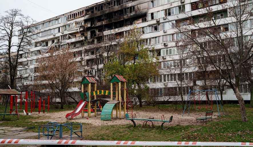 A residential building is seen heavily damaged after a Russian strike on Kyiv, Ukraine, on Tuesday, Nov. 25, 2025. (AP Photo/Evgeniy Maloletka)