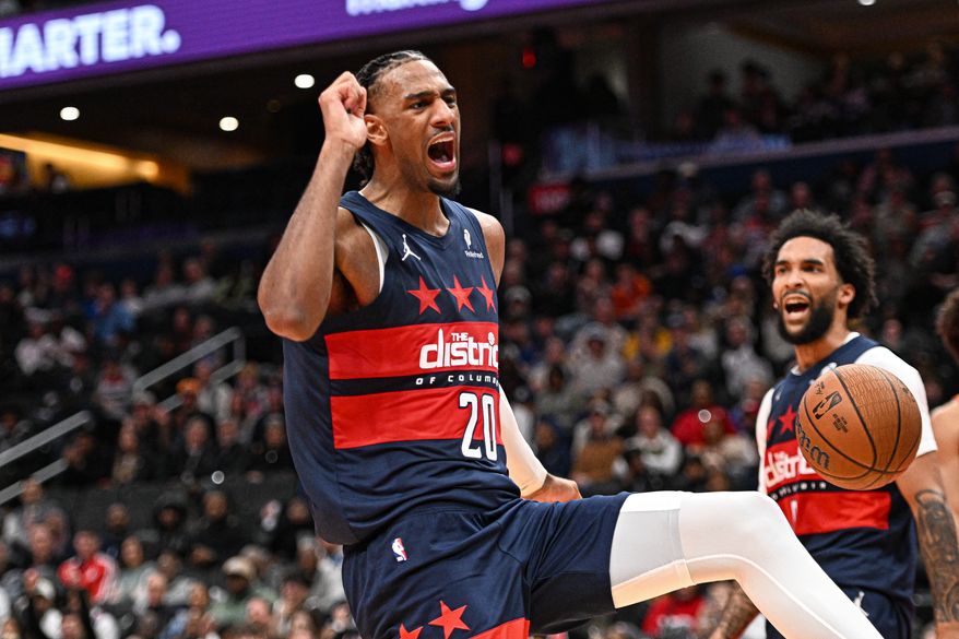 Washington Wizards center Alex Sarr (20) reacting after dunking the ball during the fourth quarter of an NBA game against the Atlanta Hawks at Capital One Arena in Washington D.C., November 25, 2025. (Photo for the Washington Times)