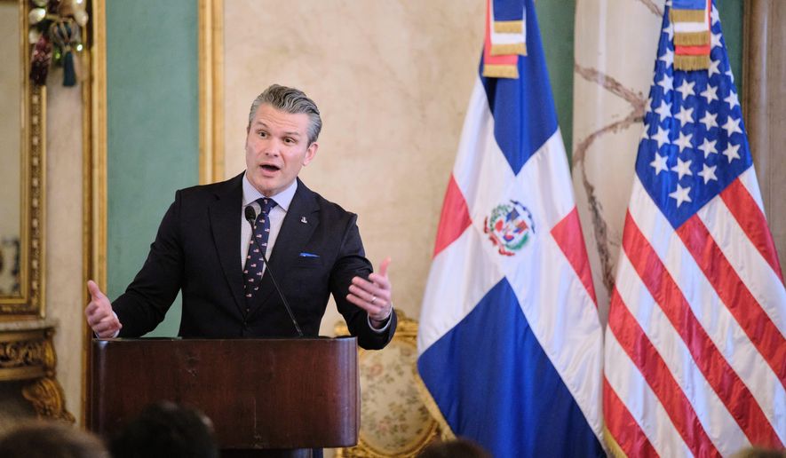 U.S. Secretary of Defense Pete Hegseth speaks during a press conference after a meeting with Dominican Republic President Luis Abinader at the National Palace in Santo Domingo, Dominican Republic, Wednesday, Nov. 26, 2025. (AP Photo/Ricardo Hernadez)