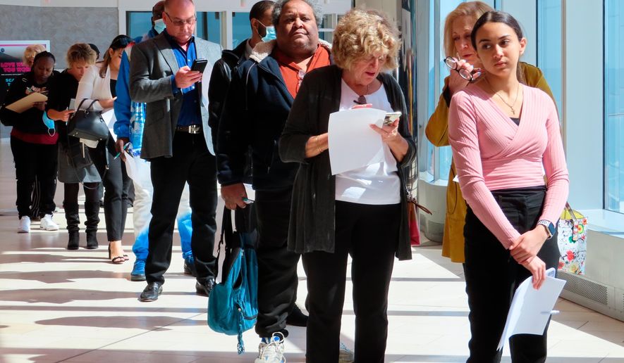 Applicants line up at a job fair at the Ocean Casino Resort in Atlantic City N.J., on April 11, 2022. (AP Photo/Wayne Parry, File)