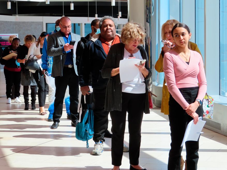 Applicants line up at a job fair at the Ocean Casino Resort in Atlantic City N.J., on April 11, 2022. (AP Photo/Wayne Parry, File)
