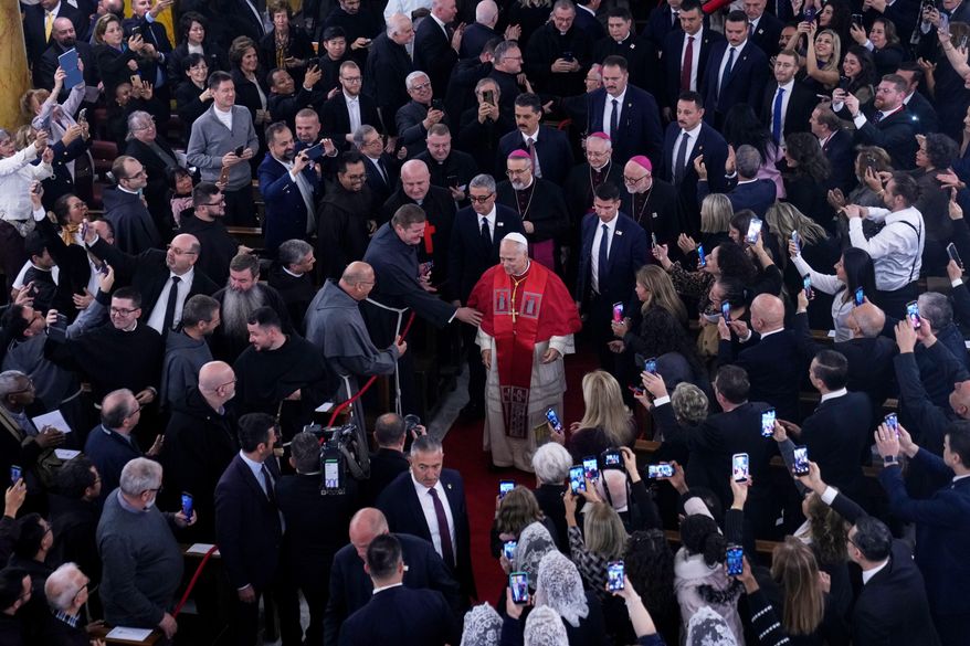 Pope Leo XIV arrives for a meeting with the clergy at the Cathedral of the Holy Spirit, in Istanbul, Turkey, Friday, Nov. 28, 2025. (AP Photo/Domenico Stinellis)