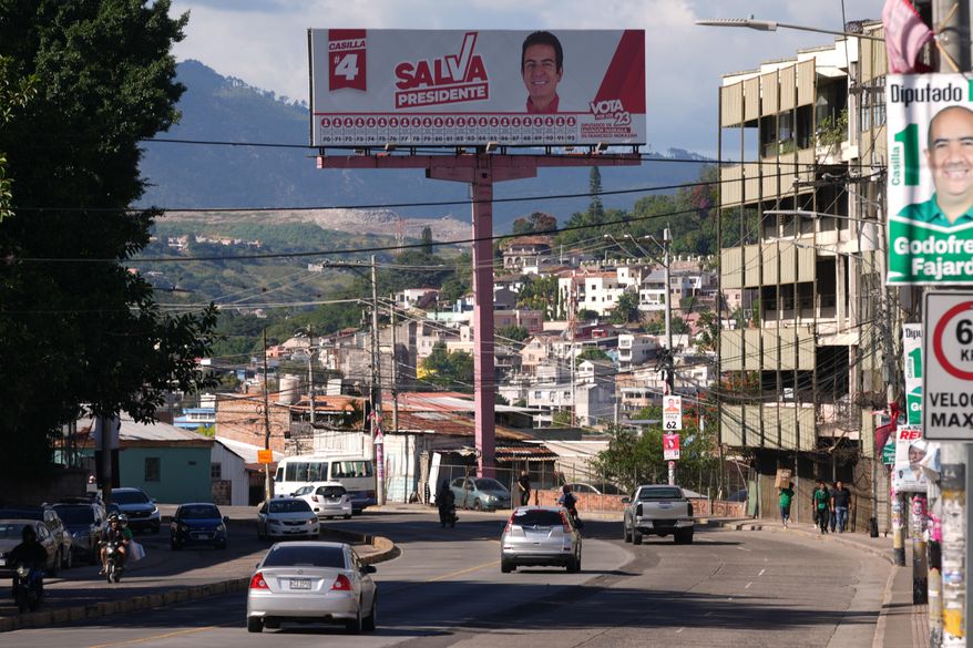 A billboard promoting presidential candidate Salvador Nasralla of the Liberal Party stands in Tegucigalpa, Honduras, Thursday, Nov. 27, 2025, prior to general elections. (AP Photo/Moises Castillo)