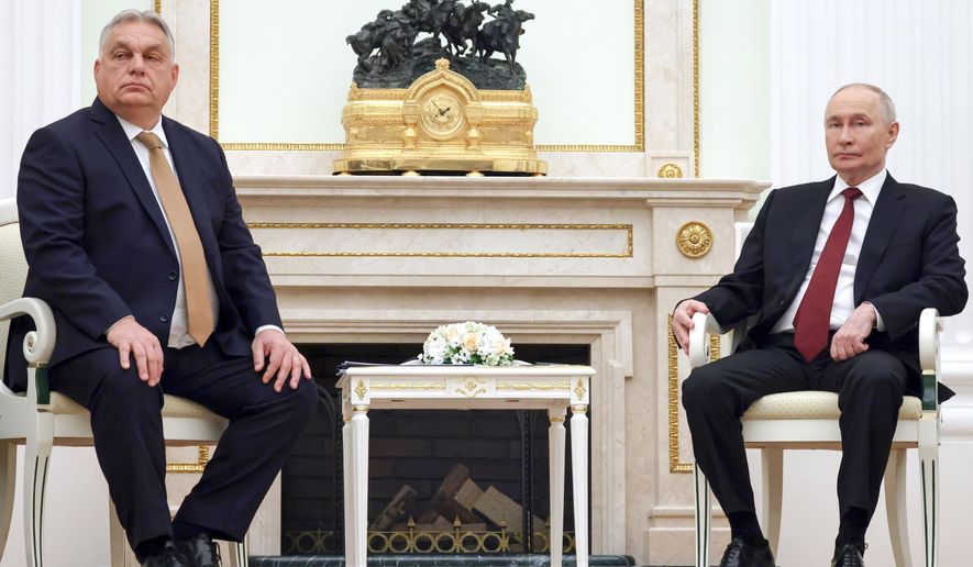 Russian President Vladimir Putin, right, attends a meeting with Hungarian Prime Minister Viktor Orban at the Senate Palace of the Kremlin in Moscow, Russia, Friday, Nov. 28, 2025. (Vladimir Gerdo, Sputnik, Kremlin Pool Photo via AP) **FILE**