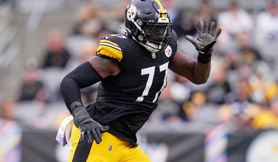 Pittsburgh Steelers offensive tackle Broderick Jones (77) plays during an NFL football game against the Cleveland Browns in Pittsburgh Oct. 12, 2025. (AP Photo/Gene J. Puskar, File)