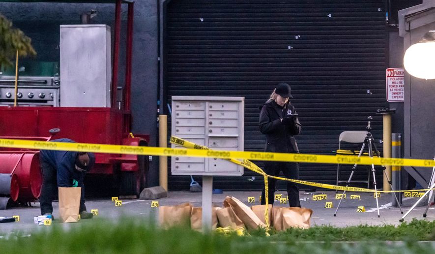 Investigators with the San Joaquin Sheriff's Department collect evidence at the site of Saturday's shooting at a banquet hall in Stockton, Calif., Sunday, Nov. 30, 2025. (Carlos Avila Gonzalez/San Francisco Chronicle via AP)