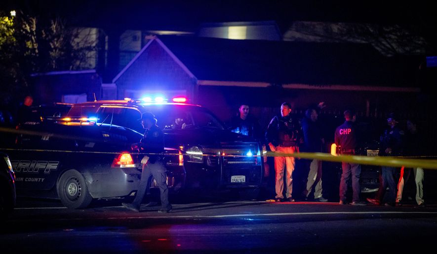 First responders at scene of a mass shooting Saturday, Nov. 29, 2025, in Stockton, Calif. (AP Photo/Ethan Swope)