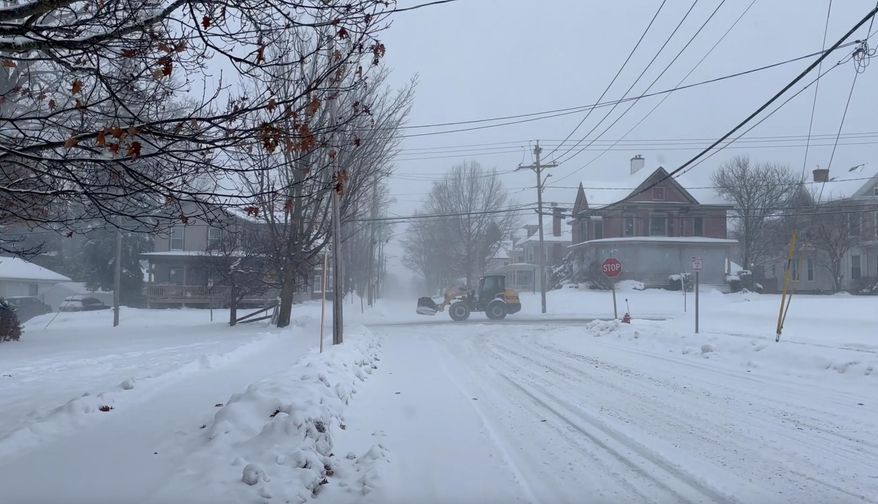A snowplow sets out in Lowville, N.Y., on Sunday, Nov. 30, 2025. (AP Photo/Cara Anna)