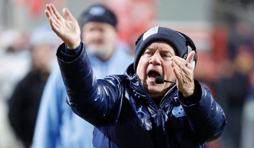 North Carolina head coach Bill Belichick protests a call during the second half of an NCAA college football game against North Carolina State in Raleigh, N.C., Saturday, Nov. 29, 2025. (AP Photo/Karl DeBlaker)