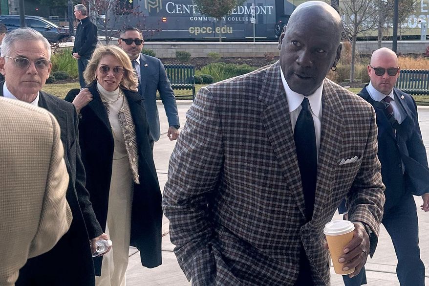 Michael Jordan arrives in the Western District of North Carolina on Monday Dec 1, 2025 for the start of the antitrust trial between 23XI Racing and Front Row Motorsports against NASCAR, in Charlotte, N.C. (AP Photo/Jenna Fryer)