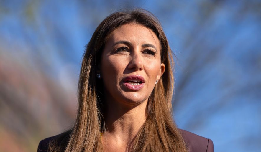 Alina Habba, President Donald Trump's pick to be the interim U.S. Attorney for New Jersey, speaks with reporters outside the White House, March 26, 2025, in Washington. (AP Photo/Mark Schiefelbein, File)