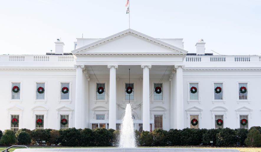 Wreaths decorate the White House, Monday, Dec. 1, 2025, in Washington. (AP Photo/Julia Demaree Nikhinson)