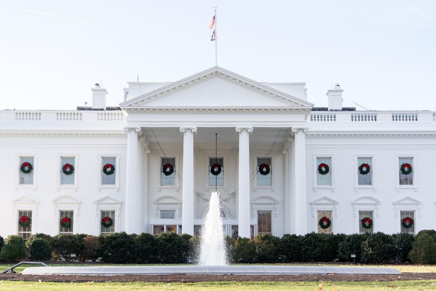 Wreaths decorate the White House, Monday, Dec. 1, 2025, in Washington. (AP Photo/Julia Demaree Nikhinson)