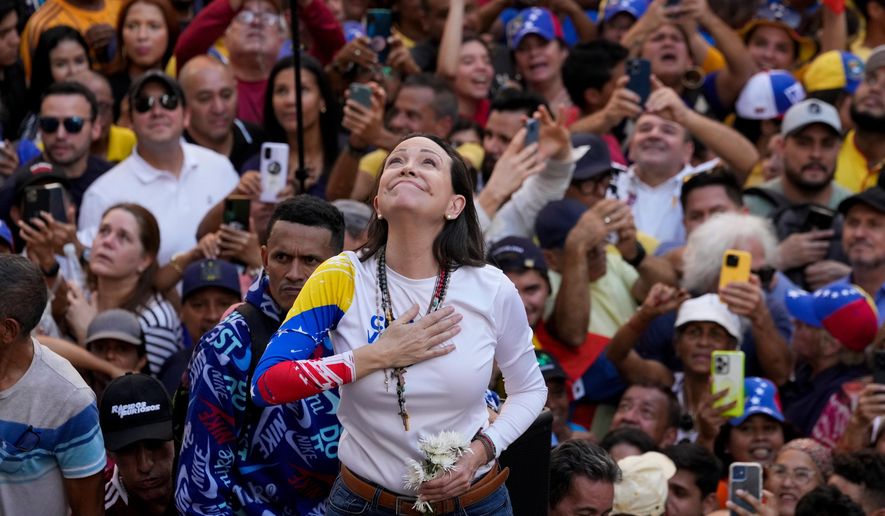 Venezuelan opposition leader Maria Corina Machado addresses supporters at a protest against President Nicolas Maduro in Caracas, Venezuela, the day before his inauguration for a third term, Jan. 9, 2025. (AP Photo/Ariana Cubillos, File)