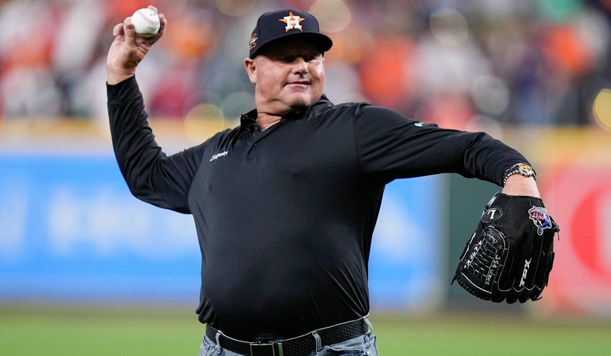 Houston Astros player Roger Clemens throws out the ceremonial pitch ahead of Game 1 of baseball's American League Championship Series between the Houston Astros and the New York Yankees, Oct. 19, 2022, in Houston. (AP Photo/Kevin M. Cox, File)