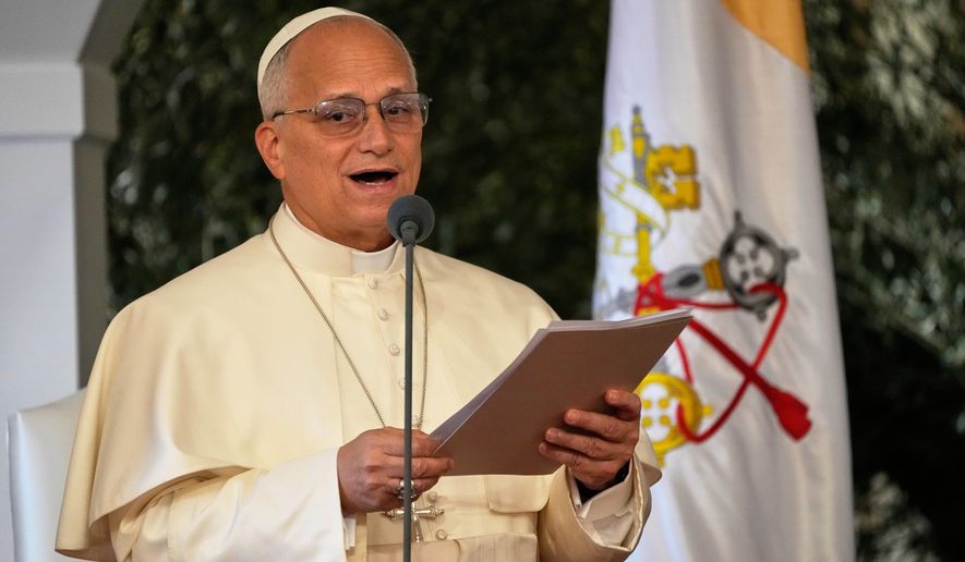 Pope Leo XIV reads a speech during a farewell ceremony at the Beirut International Airport in Beirut, Lebanon, Tuesday, Dec. 2, 12025.(AP Photo/Hussein Malla)