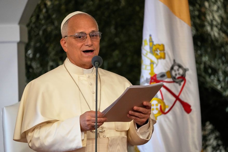 Pope Leo XIV reads a speech during a farewell ceremony at the Beirut International Airport in Beirut, Lebanon, Tuesday, Dec. 2, 12025.(AP Photo/Hussein Malla)