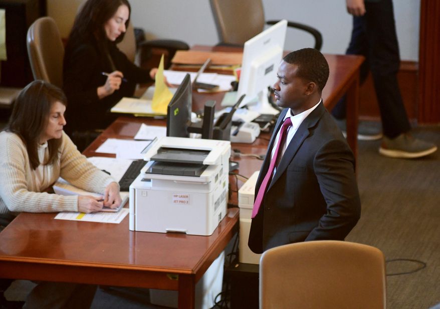 Sheldon Timothy Herrington Jr., who is on trial on a capital murder charge in the 2022 death of University of Mississippi student Jimmie "Jay" Lee, looks out into the courtroom during the lunch break, in Oxford, Miss., on Dec. 3, 2024. (Bruce Newman/The Northeast Mississippi Daily Journal via AP, Pool, File)