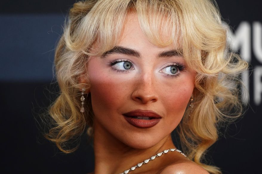 Sabrina Carpenter arrives at the 67th annual Grammy Awards on Feb. 2, 2025, in Los Angeles. (Photo by Jordan Strauss/Invision/AP, File)