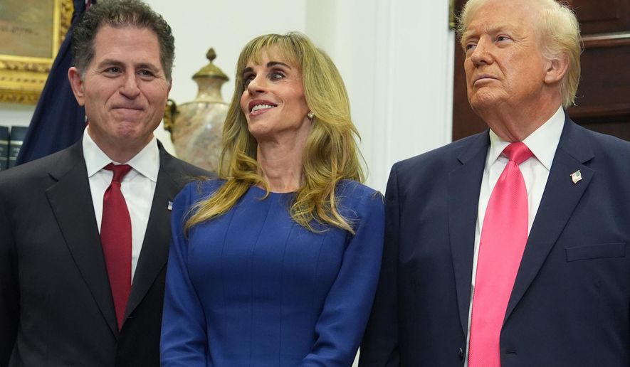 Michael Dell, left, his wife Susan and President Donald Trump listen during an event on "Trump Accounts" for kids in the Roosevelt Room of the White House, Tuesday, Dec. 2, 2025, in Washington. (AP Photo/Evan Vucci)