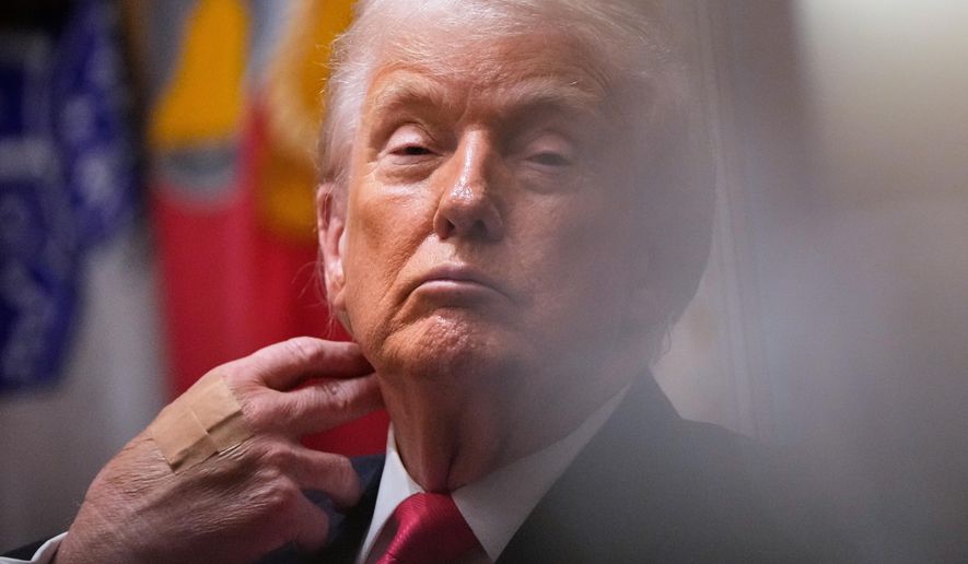 President Donald Trump listens during a Cabinet meeting at the White House, Tuesday, Dec. 2, 2025, in Washington. (AP Photo/Julia Demaree Nikhinson)