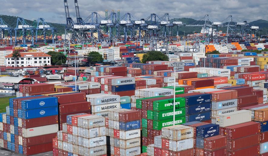 FILE - Ship containers are stacked at the Panama Canal Balboa port, operated by the Panama Ports Company, in Panama City, Sept. 20, 2025. (AP Photo/Matias Delacroix, File)