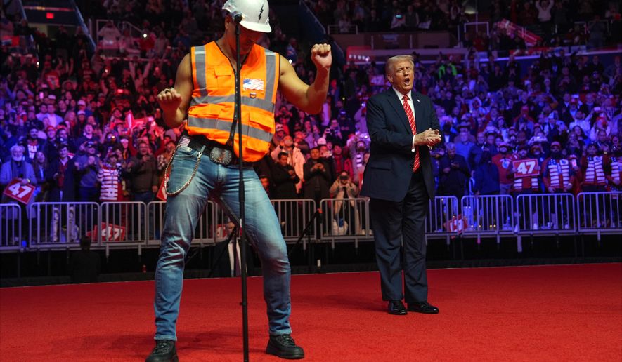 President-elect Donald Trump dances with The Village People at a rally ahead of the 60th Presidential Inauguration, Jan. 19, 2025, in Washington. (AP Photo/Evan Vucci, File)