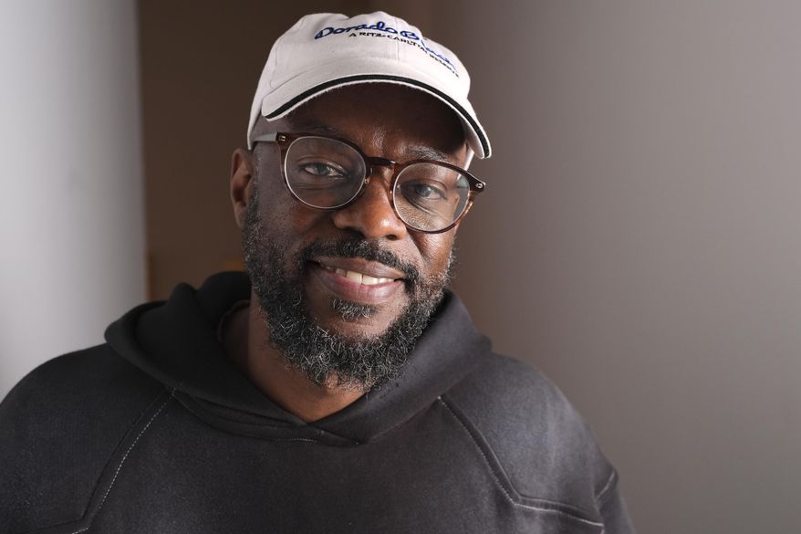 Willonius Hatcher, also known as King Willonius, poses for a portrait near his presentation at the a16z AI Creative Gallery, Thursday, Sept. 18, 2025, in New York. (AP Photo/Frank Franklin II)