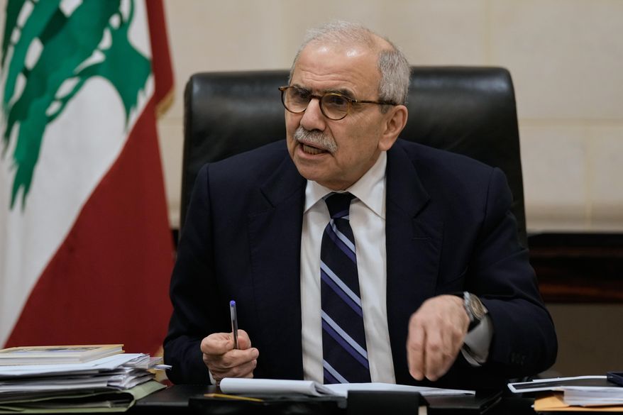 Lebanese Prime Minister Nawaf Salam speaks to journalists working for foreign media and news agencies at the government palace in Beirut, Wednesday, Dec. 3, 2025. (AP Photo/Bilal Hussein)