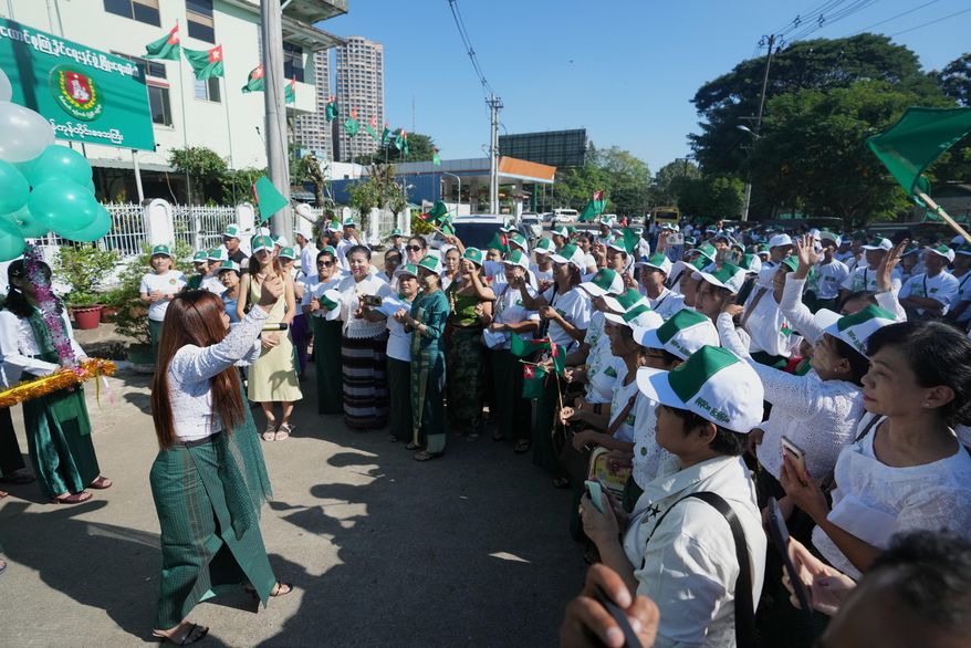 FILE - Members of the military-backed Union Solidarity and Development Party (USDP) gather for opening ceremony of the party's slogan poster during the first day of election campaign for upcoming general election at their Yangon region party's headquarters Tuesday, Oct. 28, 2025, in Yangon, Myanmar. (AP Photo/Thein Zaw, File)