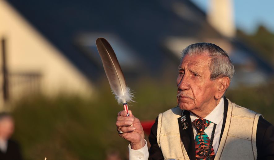 FILE - WWII veteran Charles Shay, 97 pays tribute to soldiers during a D-Day commemoration ceremony of the 78th anniversary for those who helped end World War II, in Saint-Laurent-sur-Mer, Normandy, France, Monday, June 6, 2022. (AP Photo/ Jeremias Gonzalez, File)