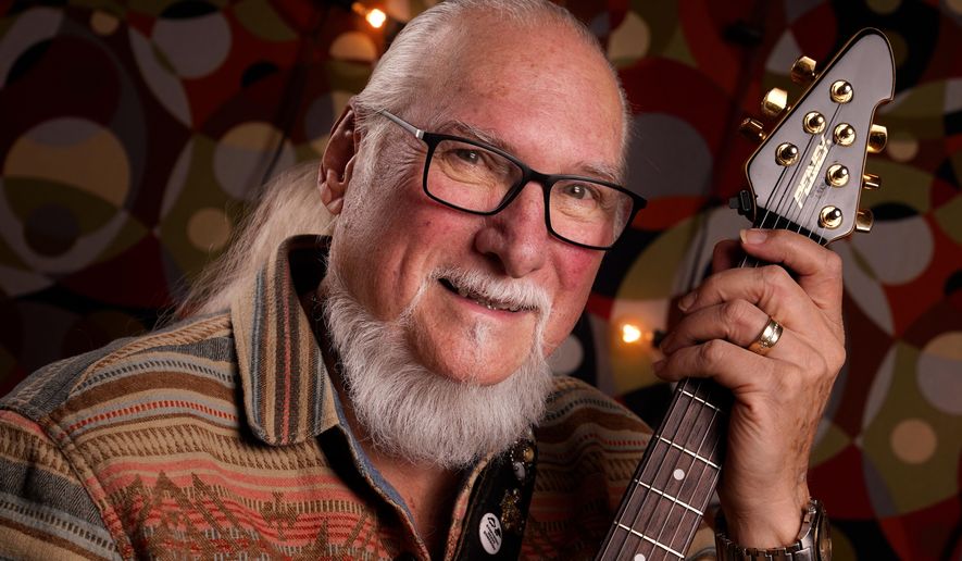 FILE - Guitarist, songwriter and record producer Steve Cropper poses Wednesday, Dec. 2, 2020, in Nashville, Tenn. (AP Photo/Mark Humphrey,File)