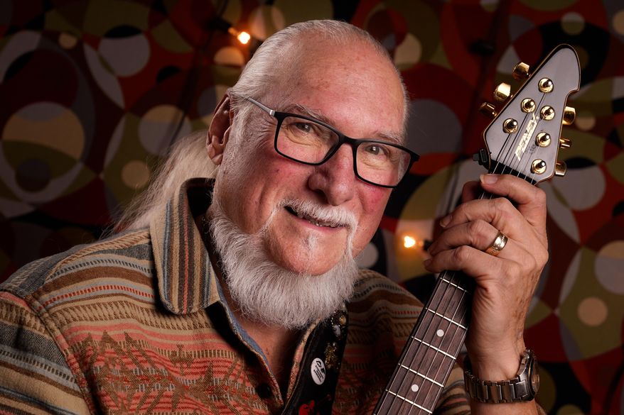 FILE - Guitarist, songwriter and record producer Steve Cropper poses Wednesday, Dec. 2, 2020, in Nashville, Tenn. (AP Photo/Mark Humphrey,File)
