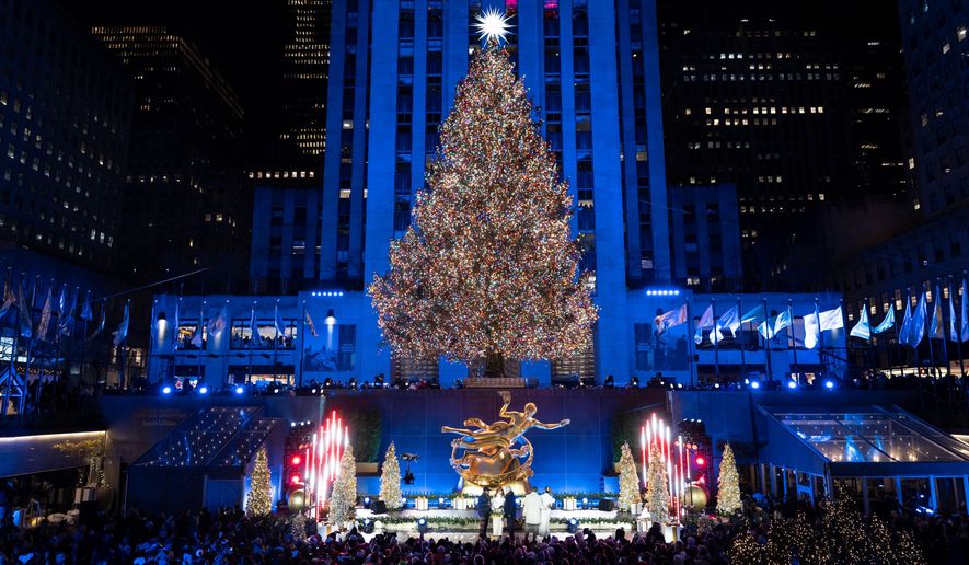 The Rockefeller Center Christmas tree after being lit during the 93rd annual Rockefeller Center Christmas tree lighting ceremony, Wednesday, Dec. 3, 2025, in New York. (AP Photo/Yuki Iwamura)