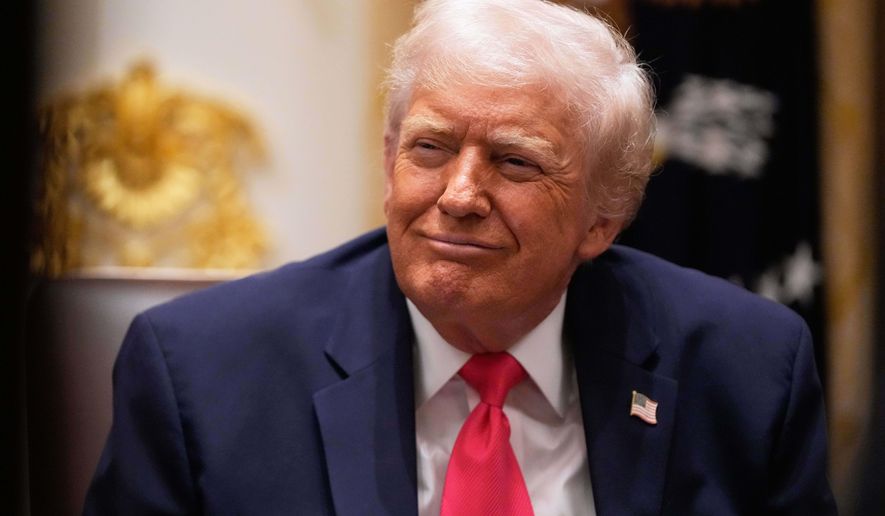 President Donald Trump listens during a Cabinet meeting at the White House, Tuesday, Dec. 2, 2025, in Washington. (AP Photo/Julia Demaree Nikhinson)