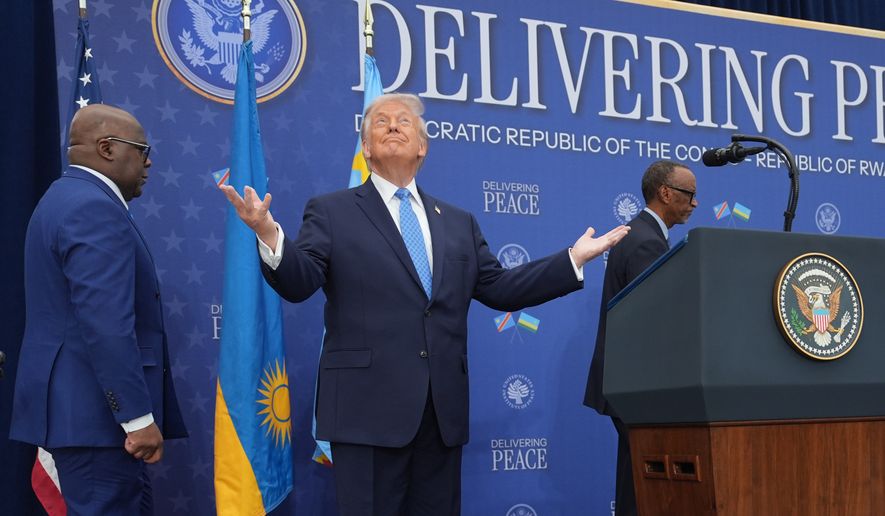 President Donald Trump arrives for a signing ceremony with Rwanda's President Paul Kagame and Democratic Republic of Congo President Felix-Antoine Tshisekedi at the Donald J. Trump Institute of Peace, Thursday, Dec. 4, 2025, in Washington. (AP Photo/Evan Vucci)