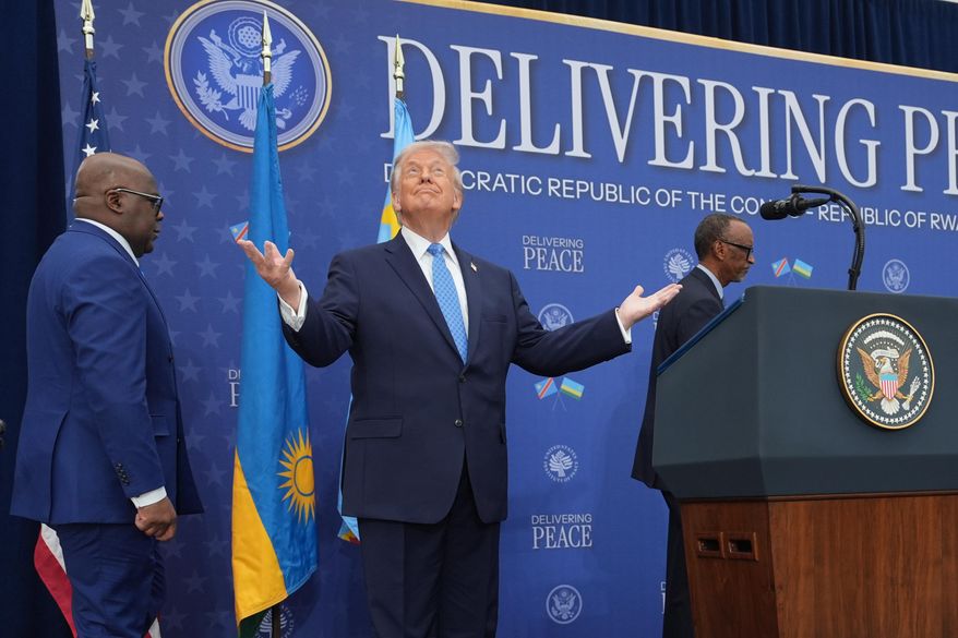 President Donald Trump arrives for a signing ceremony with Rwanda's President Paul Kagame and Democratic Republic of Congo President Felix-Antoine Tshisekedi at the Donald J. Trump Institute of Peace, Thursday, Dec. 4, 2025, in Washington. (AP Photo/Evan Vucci)