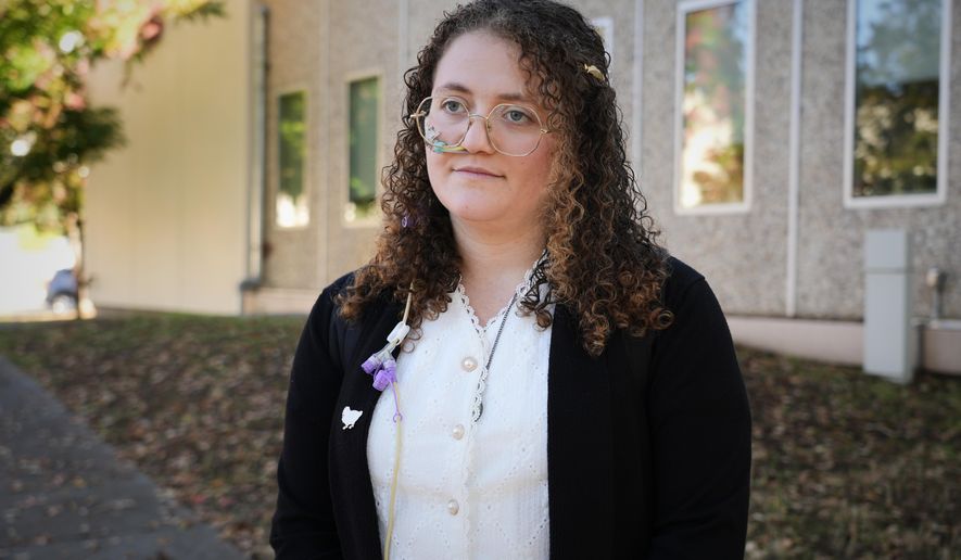 FILE - Animal rights activist Zoe Rosenberg, who is on trial after taking four chickens from one of Perdue Farms' major poultry plants, is pictured outside Sonoma County Superior Court in Santa Rosa, Calif. on Tuesday, Oct. 28, 2025. (AP Photo/Terry Chea, File)