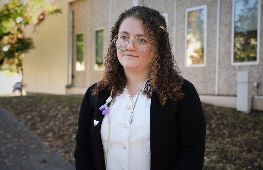 FILE - Animal rights activist Zoe Rosenberg, who is on trial after taking four chickens from one of Perdue Farms' major poultry plants, is pictured outside Sonoma County Superior Court in Santa Rosa, Calif. on Tuesday, Oct. 28, 2025. (AP Photo/Terry Chea, File)