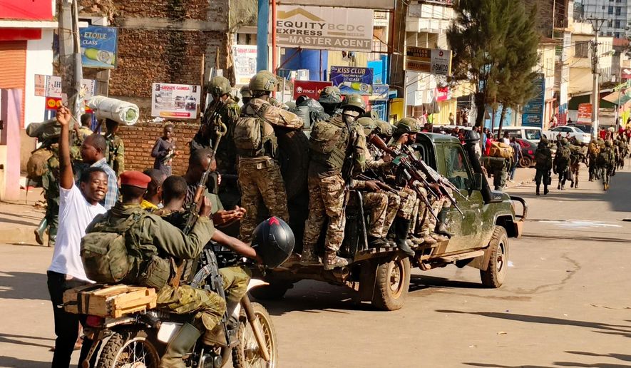 FILE - M23 rebels enter the centre of east Congo's second-largest city, Bukavu, and take control of the South Kivu province administrative office, Sunday, Feb. 16, 2025. (AP Photo/Janvier Barhahiga, File)