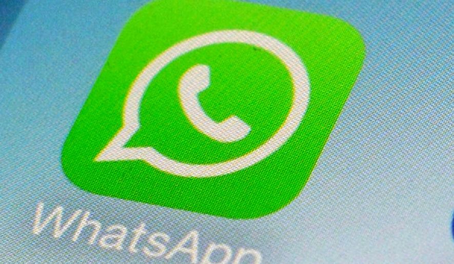 FILE - WhatsApp app icon on a smartphone in New York onFeb. 19, 2014. (AP Photo/Patrick Sison, File)