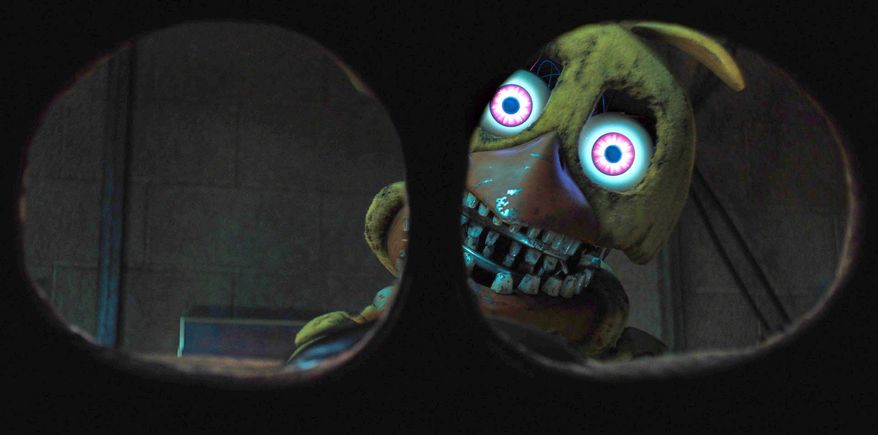 This image released by Universal Pictures shows a Withered Chica in a scene from "Five Nights at Freddy's 2." (Ryan Green/Universal Pictures via AP)