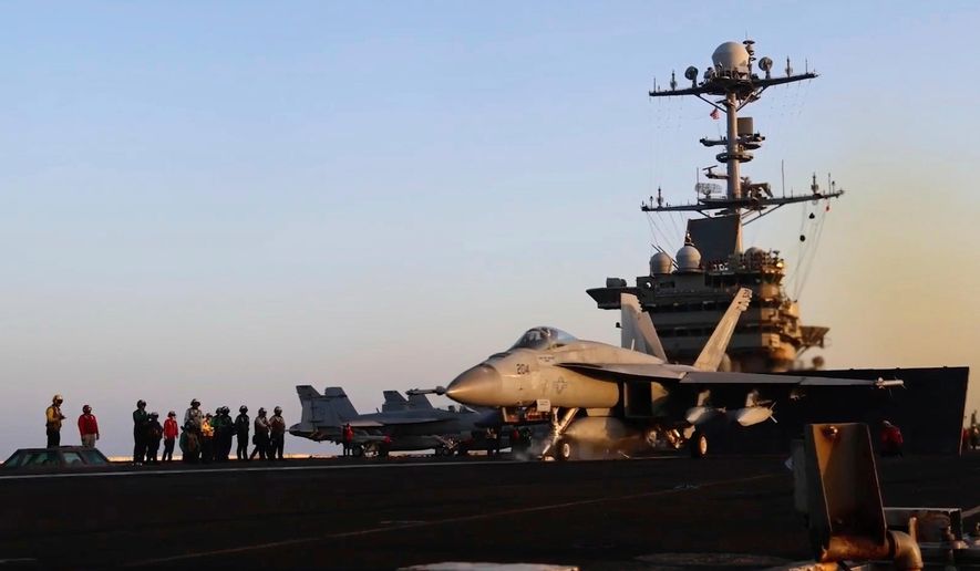 This image taken from video provided by the U.S. Navy shows an aircraft launching from the USS Harry S. Truman in the Red Sea before airstrikes in Sanaa, Yemen, March 15, 2025. (U.S. Navy via AP, File)