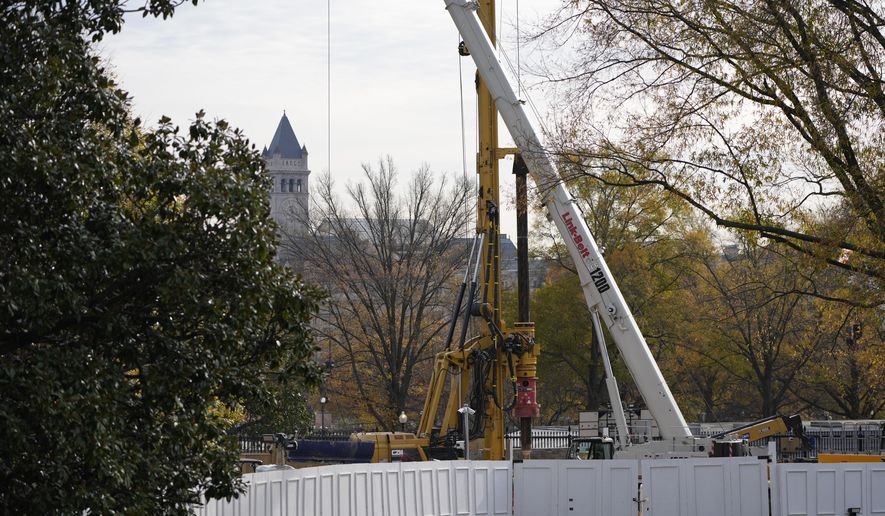 Construction of a new ballroom continues on the East Wing of the White House, Tuesday, Nov. 23, 2025, in Washington. (AP Photo/Alex Brandon)