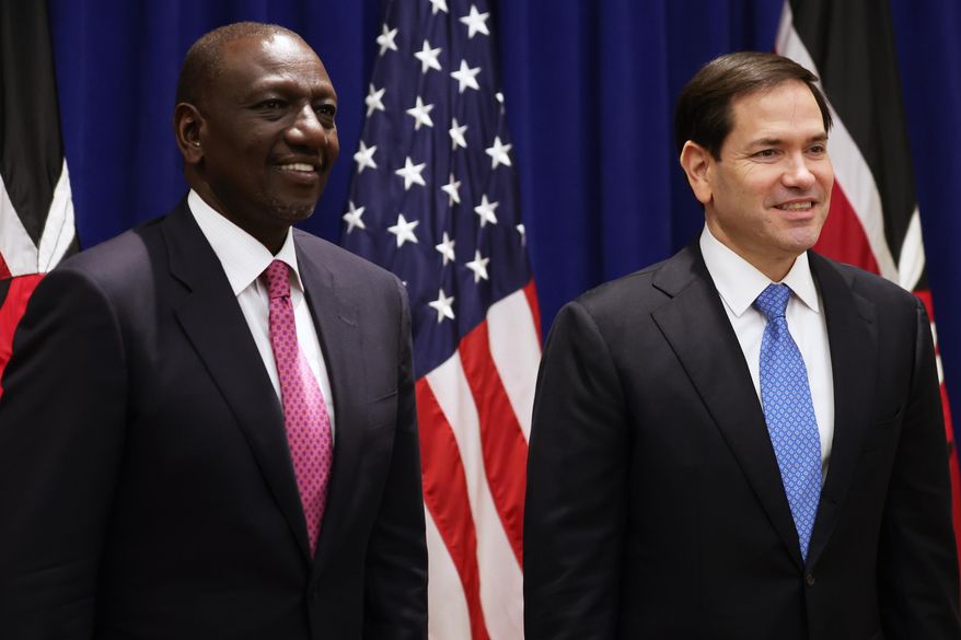 U.S. Secretary of State Marco Rubio, right, and Kenyan President William Ruto pose for photos before a meeting, Sept. 24, 2025, in New York. (AP Photo/Heather Khalifa, Pool, file)