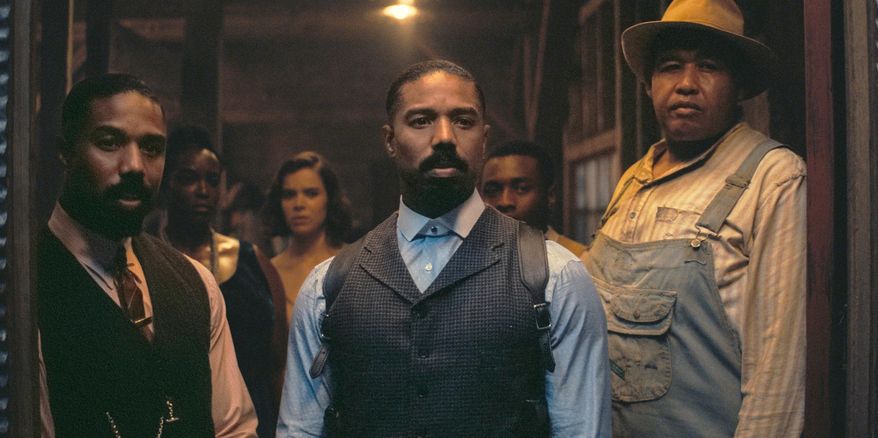 This image released by Warner Bros Pictures shows Michael B. Jordan, foreground from left, Michael B. Jordan and Omar Benson Miller in a scene from "Sinners." (Warner Bros. Pictures via AP)